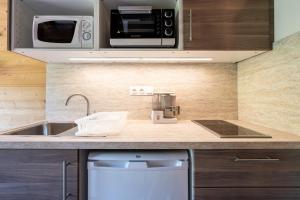 Appartements Studio 15 - La Marmotte : photos des chambres