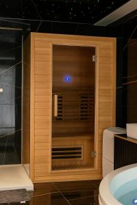 Appartements Nuit Dans les Etoiles - Spa Balneo & Sauna Prive : photos des chambres