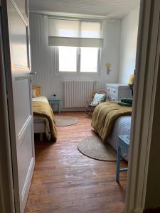 Maisons de vacances Maison plages & centre a pieds - proche GR34 : photos des chambres