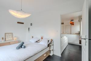 Appartements Aux Charmilles - A proximite plage du Lac Leman : photos des chambres