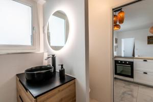 Appartements Aux Charmilles - A proximite plage du Lac Leman : photos des chambres