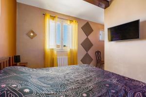 Maisons de vacances La Maison Ensoleillee - Avec jardin et terrasse : photos des chambres