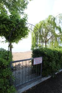 Lussuoso Appartamento vista lago con spiaggia privata