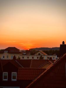 Haus HarzZauber - Elegantes Ferienquartier in der Altstadt mit Terrasse, Kamin und E-Bikes für die perfekte Auszeit