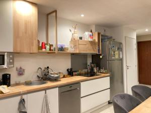 Appartements La Grande Coloc – 4 chambres & 2 salles de bain : photos des chambres