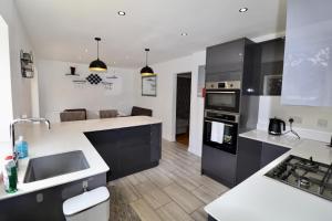 Addlestone Spacious Four Bedroom House