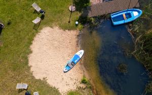 3 WIDOKI Kiekrz -domki Tiny House z prywatną plażą i pomostem nad jeziorem Kierskim