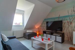 Appartements Le Haut du Nelud - Appt dans maison avec jardin : photos des chambres
