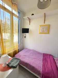 Appartements La ContrEscarpe - Studios fonctionnels - Secteur GARE CENTRE : photos des chambres