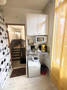 Appartements La ContrEscarpe - Studios fonctionnels - Secteur GARE CENTRE : photos des chambres