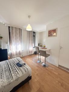 Appartements La ContrEscarpe - Studios fonctionnels - Secteur GARE CENTRE : photos des chambres