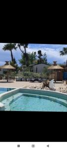 Campings les sables du midi mobil home bougainvilliers : photos des chambres