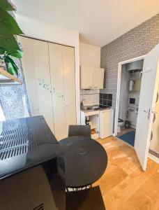 Appartements La ContrEscarpe - Studios fonctionnels - Secteur GARE CENTRE : photos des chambres