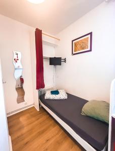 Appartements La ContrEscarpe - Studios fonctionnels - Secteur GARE CENTRE : photos des chambres