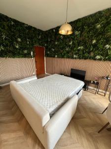 Appartements Appartement au pied des remparts : photos des chambres
