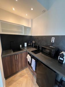 Appartements Appartement au pied des remparts : photos des chambres