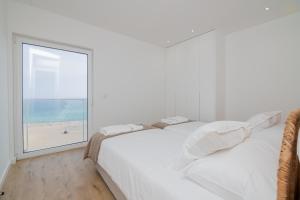 Praia da Rocha - By The Sea