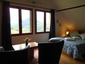 Sejours a la ferme La Ferme aux Sangliers - Micalet : photos des chambres