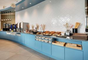 Hotels B&B HOTEL Lille Lillenium Eurasante : photos des chambres