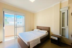 Praia de Palmas 400m do mar, perto do comércio - 0198