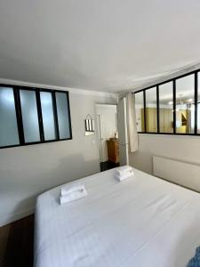 Appartements PARISIAN HOME l MONTORGUEIL : photos des chambres