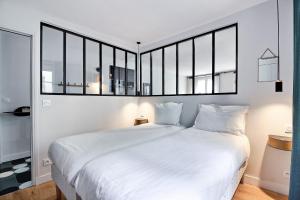 Appartements PARISIAN HOME l MONTORGUEIL : photos des chambres