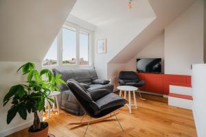 Appartements Logement calme proche centre ville : photos des chambres