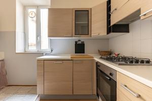 GuestHost - Cozy Apt in the Heart of Lucca