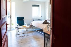 Appartements Le Petit Jardin - Charmant studio pour 2 personnes centre historique : photos des chambres