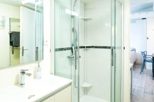 Appartements Le Petit Jardin - Charmant studio pour 2 personnes centre historique : photos des chambres