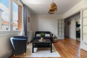 Appartements Le Desbrest - Appartement calme et lumineux en centre ville : photos des chambres