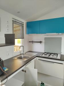 Mobilhome avec terrasse couverte à 800 m de la plage