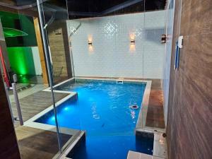 Casa em Boiçucanga com 2 suítes, piscina e sauna integrada
