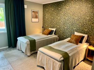 Quadruple Room with Garden View room in Vätterleden Hotell & Restaurang