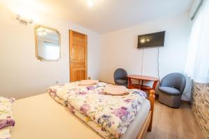 Pokoje nad jeziorem Mikołajki