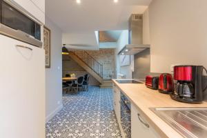 Appartements Les vignes blanches : photos des chambres