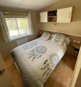 Campings Le grand air, mobil-home XXL : photos des chambres