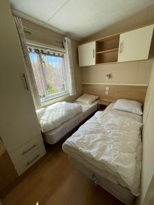 Campings Le grand air, mobil-home XXL : photos des chambres