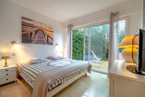 Villas Nice air-conditioned house with flower garden : photos des chambres