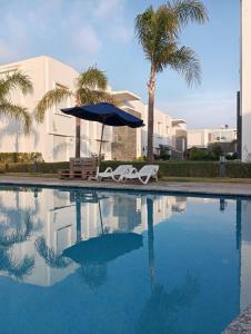 Appartement Familial avec Jardin, Résidence avec Piscine Dar El Bahr