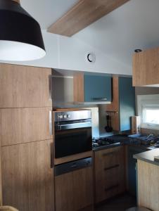 Campings les sables du midi mobil home bougainvilliers : photos des chambres