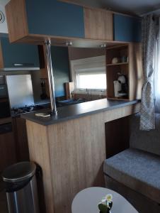 Campings les sables du midi mobil home bougainvilliers : photos des chambres