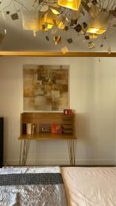 Signature topfloor flat in a shared XIX century Mansion in Western Paris