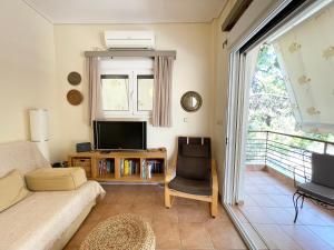 Saronida Beach Nest Apartment - 3hvězdičkové hotely ve městě Saronida