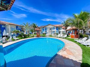 Casas no Residencial Mont Sião com 2 ou 3 suítes (todas com ar condicionado) condomíno a poucos metros da praia de Taperapuã (Axé Moi), com 2 piscinas adulto, 2 infantil, sauna e 2 portarias, casas com internet privativa 300MBPS