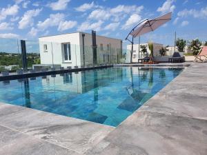 Villas villa with swimming pool : photos des chambres