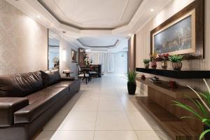 Apto 2Q c Garagem e churrasq. 450m do mar EAN503