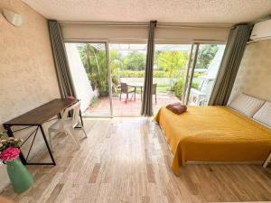 Private terrace, pool & beach just steps away