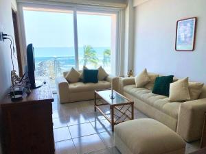 Frente a la Playa con acceso directo AC Alberca y Elevador