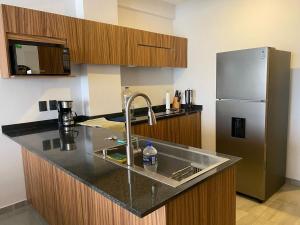 Frente a la Playa con acceso directo AC Alberca y Elevador